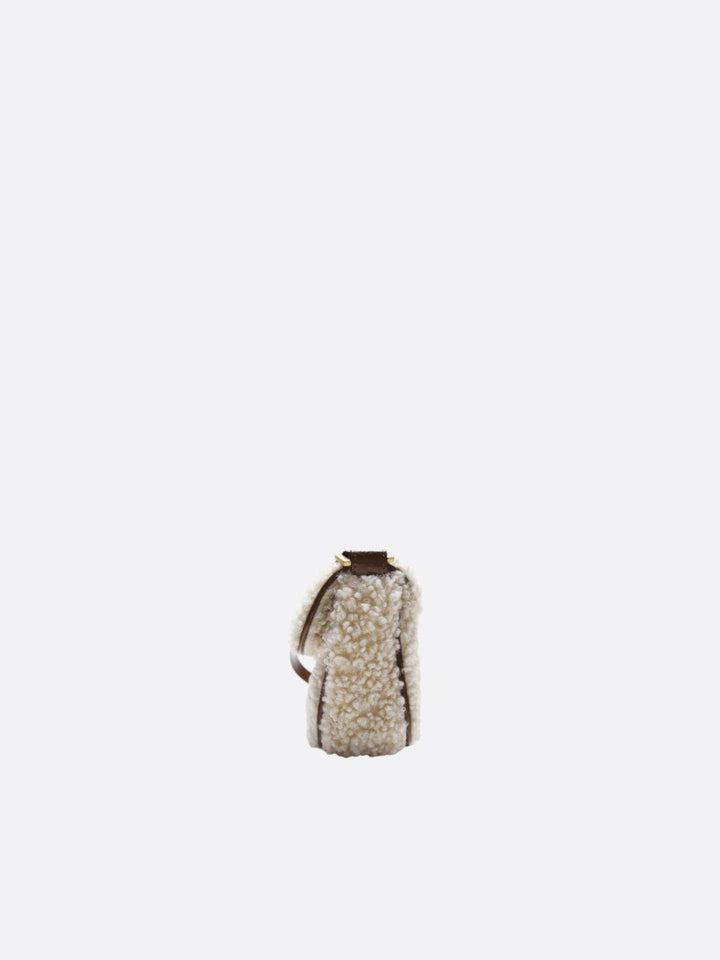 Sac bandoulière en moumoute<br>Nivéo